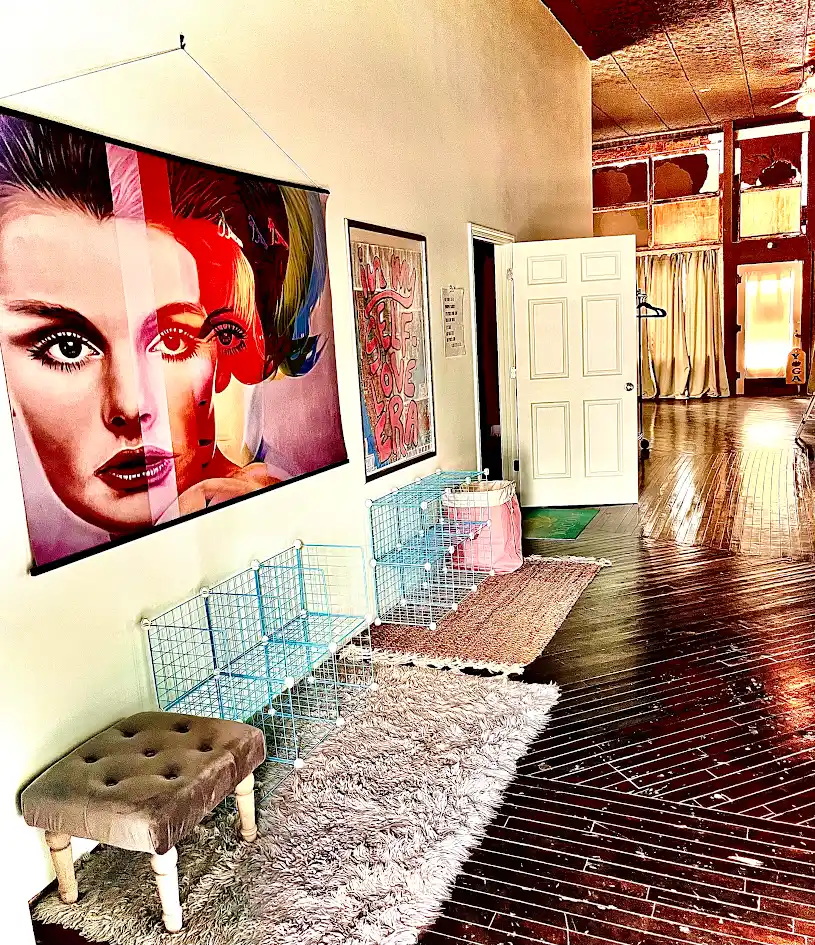 The entry of Yoga on Main with cubbies for shoes and warm brick floors